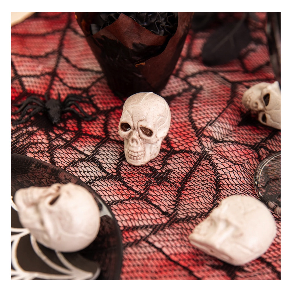 The Halloween table decoration Skulls - 12 pcs.