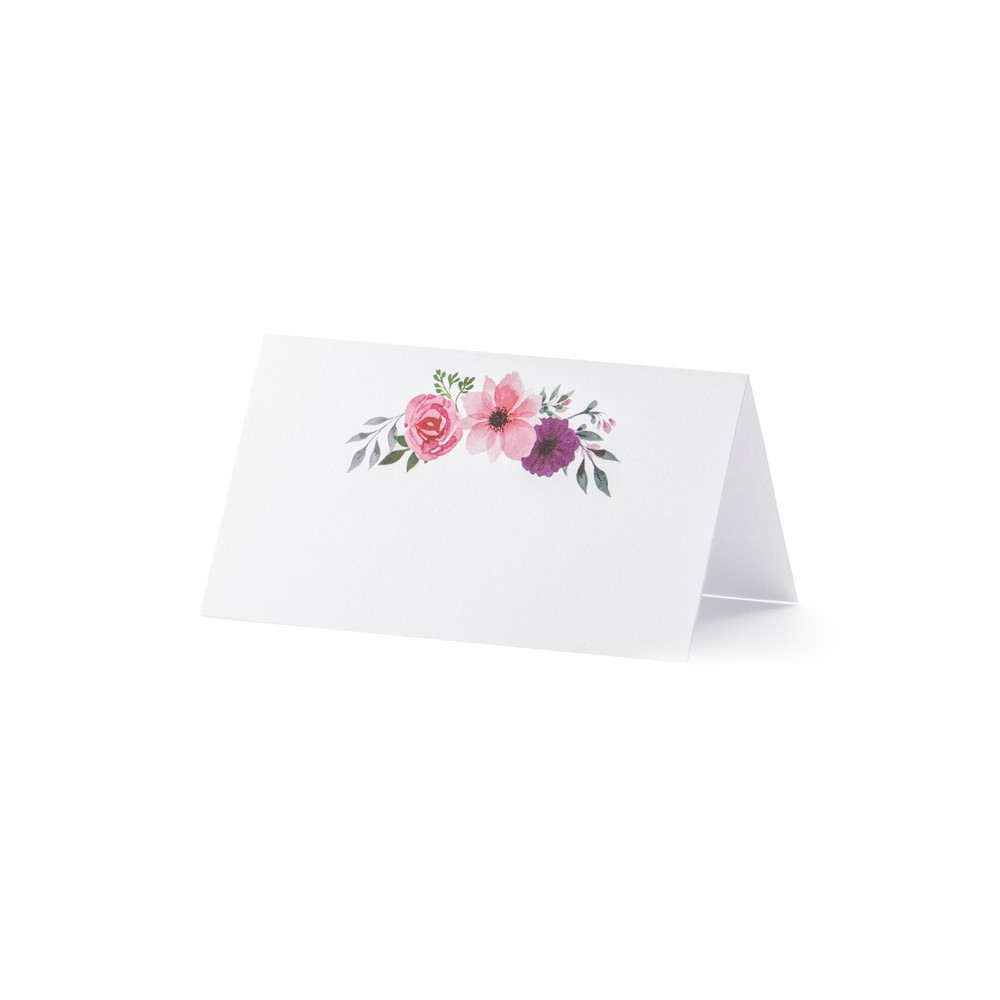 Business cards on the table, flowers